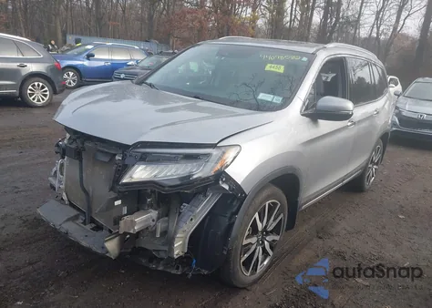 2019 Honda Pilot Touring z USA, uszkodzony, nr VIN 5FNYF6H92KB082566